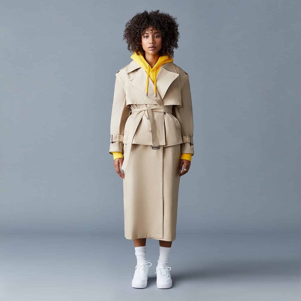 Model in a beige trench coat