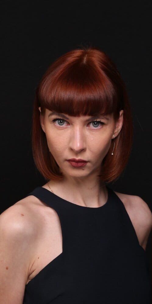 The same portrait before retouching