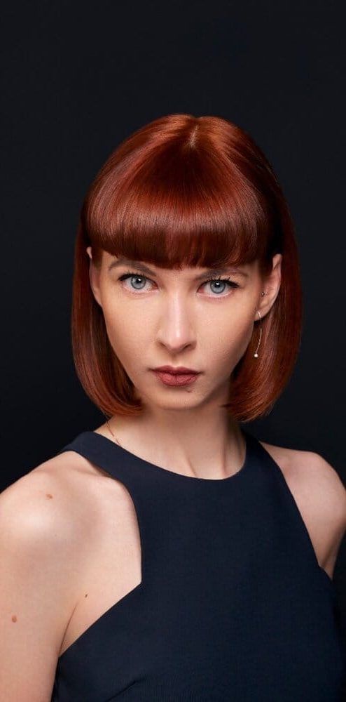Red-haired model portrait after beauty retouching